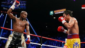 Pacquiao играл с контузено рамо